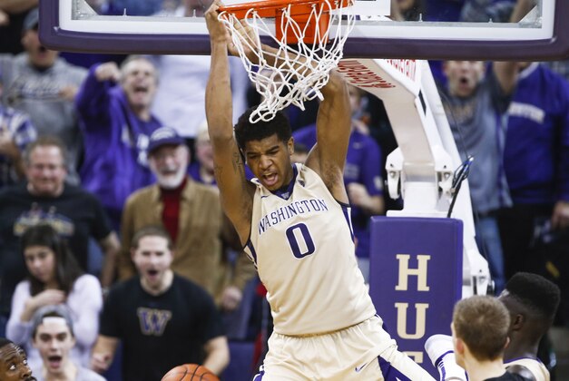 Feb 3, 2016; Seattle, WA, USA; Washington Huskies forward Marquese Chriss (0) dunks against Arizona State Sun Devils forward Obinna Oleka (5) during the second half at Alaska Airlines Arena. Mandatory Credit: Joe Nicholson-USA TODAY Sports