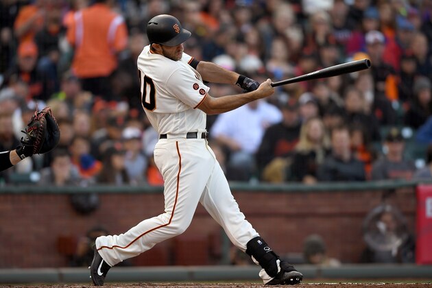 SAN FRANCISCO, CA - MAY 22:  Madison Bumgarner #40 of the San Francisco Giants hits an rbi double scoring Gregor Blanco #7 against the Chicago Cubs in the bottom of the fifth inning at AT&T Park on May 22, 2016 in San Francisco, California.  (Photo by Thearon W. Henderson/Getty Images)