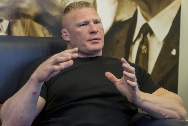 FILE - In this March 24, 2015, file photo, former UFC heavyweight champion Brock Lesnar speaks during an interview in Los Angeles. Lesnar decided this week to spurn an MMA return where he ruled for years as the heavyweight champion of both the cage and pay-per-view buyrates and signed a multi-year extension with WWE. (AP Photo/Damian Dovarganes, File)