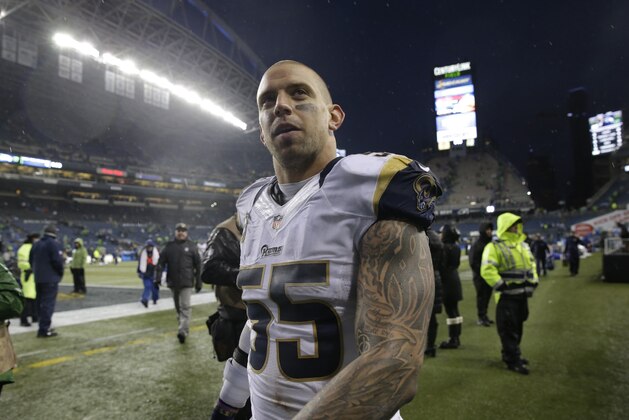 St. Louis Rams middle linebacker James Laurinaitis walks off the field after an NFL football game against the Seattle Seahawks, Sunday, Dec. 27, 2015, in Seattle. The Rams won 23-17. (AP Photo/Stephen Brashear)