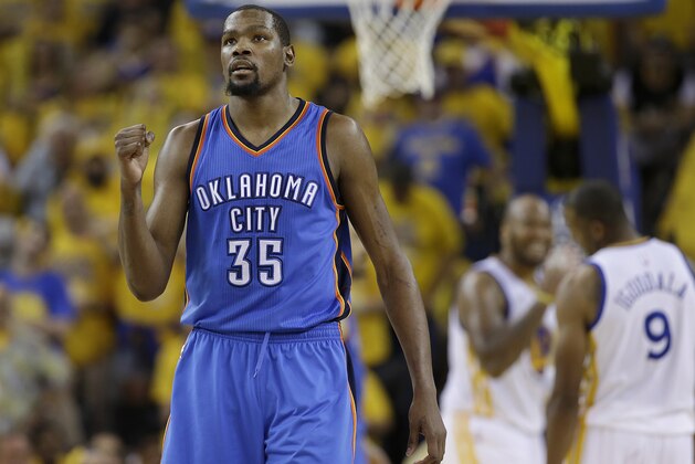 Oklahoma City Thunder forward Kevin Durant (35) reacts during the second half of Game 7 of the NBA basketball Western Conference finals against the Golden State Warriors in Oakland, Calif., Monday, May 30, 2016. (AP Photo/Marcio Jose Sanchez)