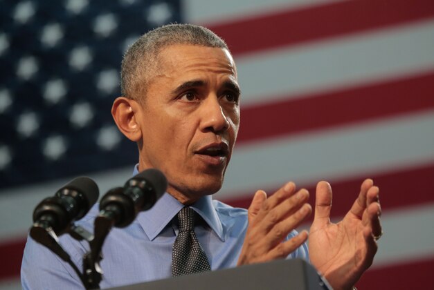 May 4, 2016; Flint, MI, USA; President Barack Obama speaks to a crowd about the Flint water crisis at Flint Northwestern High School. Mandatory Credit: Ryan Garza/Detroit Free Press via USA TODAY Network