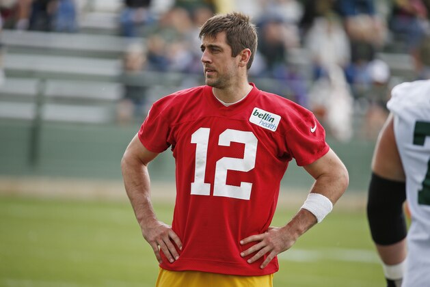 Green Bay Packers quarterback Aaron Rodgers stretches during an NFL football practice Monday June 6, 2016, in Green Bay, Wis. (AP Photo/Matt Ludtke)