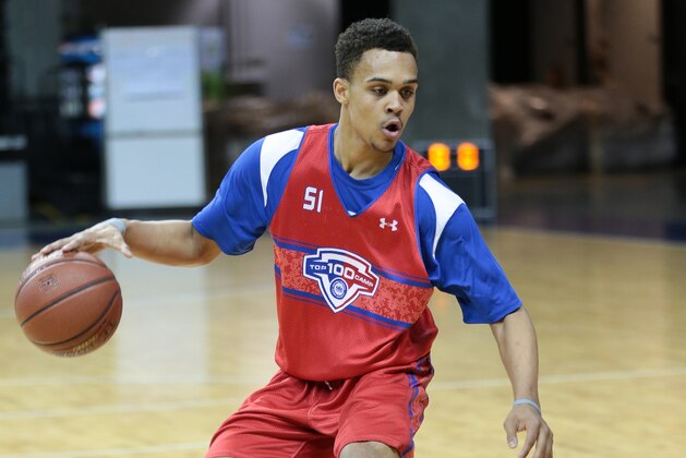 CHARLOTTESVILLE, VA - JUNE 19: Gary Trent Jr. #51 in red looking for a layup during the NBPA Top 100 Camp on June 19, 2015 at John Paul Jones Arena in Charlottesville, Virginia. (Photo by Kelly Kline/Getty Images)