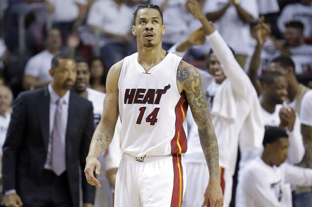Miami Heat forward Gerald Green (14) walks on the court after scoring against the Charlotte Hornets during Game 7 of a first-round NBA basketball playoff series, Sunday, May 1, 2016, in Miami.  (AP Photo/Alan Diaz)