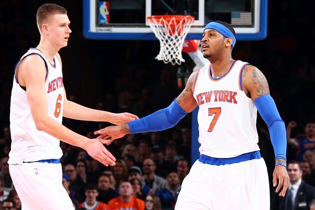 NEW YORK, NY - MARCH 26: Kristaps Porzingis #6 and Carmelo Anthony #7 of the New York Knicks celebrate against the Cleveland Cavaliers  at Madison Square Garden in New York City on November 26, 2016.  NOTE TO USER: User expressly acknowledges and agrees that, by downloading and or using this photograph, User is consenting to the terms and conditions of the Getty Images License Agreement. Mandatory Copyright Notice: Copyright 2016 NBAE  (Photo by Nathaniel S. Butler/NBAE via Getty Images)
