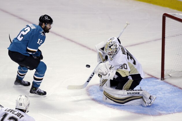 Pittsburgh Penguins goalie Matt Murray stops a shot by San Jose Sharks center Patrick Marleau (12) during the second period of Game 4 of the NHL hockey Stanley Cup Finals in San Jose, Calif., Monday, June 6, 2016. Pittsburgh won the game 3-1. (AP Photo/Eric Risberg)