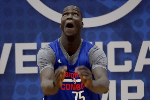 Thon Maker, from Orangeville Prep-Athlete Institute, participates in the NBA draft basketball combine Friday, May 13, 2016, in Chicago. (AP Photo/Charles Rex Arbogast)