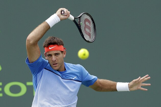 Juan Martin del Potro, of Argentina, returns to Horacio Zeballos, of Argentina, during a match at the Miami Open tennis tournament in Key Biscayne, Fla., Friday, March 25, 2016. (AP Photo/Alan Diaz)