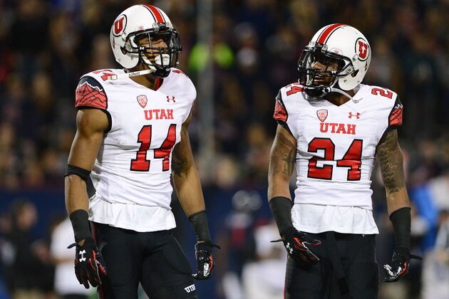 TUCSON, AZ - NOVEMBER 14: Defensive back Brian Allen #14 and wide receiver Kenric Young #24 of the Utah Utes talk on the field during the game against the Arizona Wildcats at Arizona Stadium on November 14, 2015 in Tucson, Arizona. The Wildcats defeated the Utes 37-30 in double overtime. (Photo by Jennifer Stewart/Getty Images)