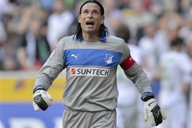 Hoffenheim goalkeeper Tim Wiese reacts after he receives the first goal during the German first division Bundesliga soccer match between Borussia Moenchengladbach and 1899 Hoffenheim in Moenchengladbach, Germany, Saturday, Aug. 25, 2012. (AP Photo/Martin Meissner) NO MOBILE USE UNTIL 2 HOURS AFTER THE MATCH, WEBSITE USERS ARE OBLIGED TO COMPLY WITH DFL-RESTRICTIONS, SEE INSTRUCTIONS FOR DETAILS