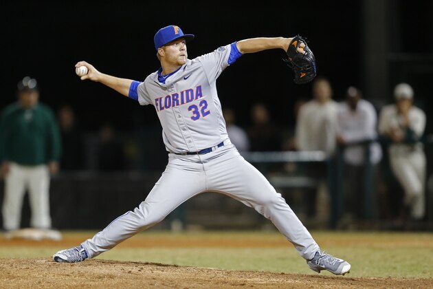 CORAL GABLES, FL - FEBRUARY 26: Logan Shore #32 of the Florida Gators throws the ball against the Miami Hurricanes in the ninth inning on February 26, 2016 at Alex Rodriguez Park at Mark Light Field in Coral Gables, Florida. Florida defeated Miami 5-0. (Photo by Joel Auerbach/Getty Images)