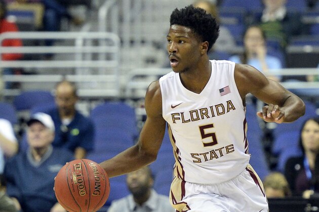 Mar 8, 2016; Washington, DC, USA; Florida State Seminoles guard Malik Beasley (5) dribbles up the court in the second half against the Boston College Eagles  during round one of the ACC tournament at Verizon Center. Florida State Seminoles defeated Boston College Eagles 88-66. Mandatory Credit: Tommy Gilligan-USA TODAY Sports