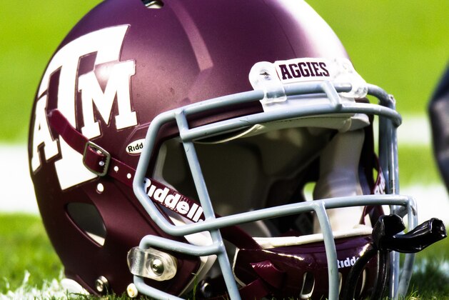 Texas A&M's helmet on the field before an NCAA college football game between Texas A&M and Western Carolina Saturday Nov. 14, 2015, in College Station, Texas. Texas A&M defeated Western Carolina 41-17. (AP Photo/Juan DeLeon)