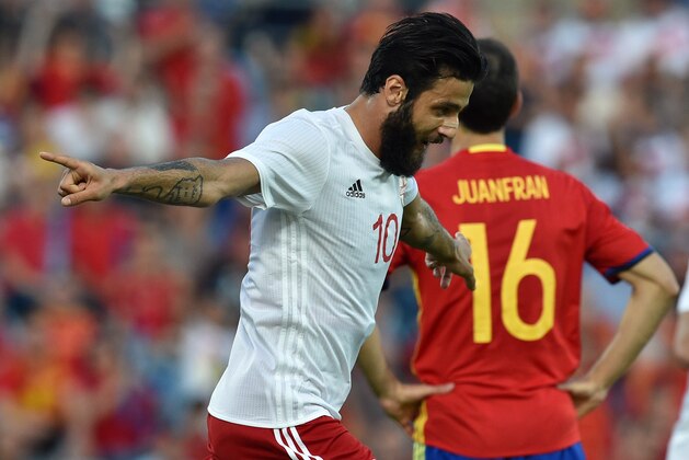 Georgia's midfielder Tornike Okriashvili celebrates after scoring during the EURO 2016 friendly football match Spain vs Georgia at the Coliseum Alfonso Perez stadium in Getafe, on June 7, 2016, in preparation for the upcoming Euro 2016 European football championship. / AFP / GERARD JULIEN        (Photo credit should read GERARD JULIEN/AFP/Getty Images)