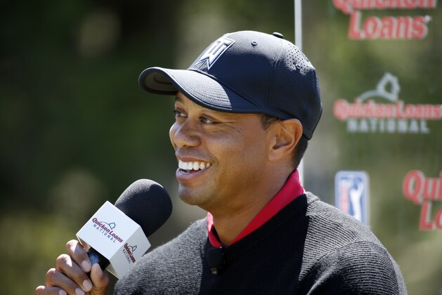 Tiger Woods speaks during a Quicken Loans National golf tournament media availability on the 10th tee at Congressional Country Club, Monday, May 16, 2016 in Bethesda, Md. (AP Photo/Alex Brandon)