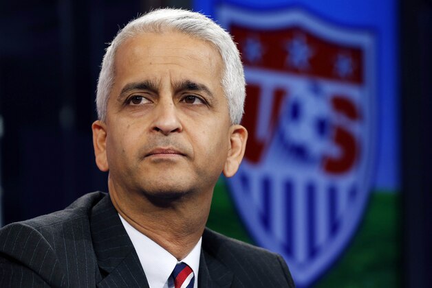 FILE - This Oct. 10, 2014, file photo shows Sunil Gulati, president of the United States Soccer Federation, during a press conference in Bristol, Conn. The United States says it will vote for Jordan's Prince Ali bin Al-Hussein for FIFA president Friday, May 29, 2015 and not for incumbent Sepp Blatter.  (AP Photo/Elise Amendola, File)