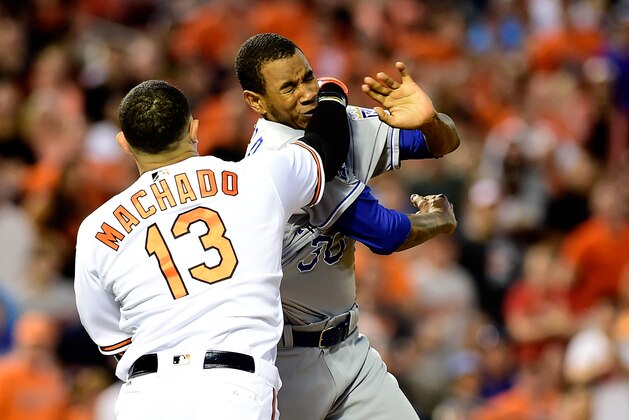 BALTIMORE, MD - JUNE 07:  Manny Machado #13 of the Baltimore Orioles and Yordano Ventura #30 of the Kansas City Royals fight in the fifth inning during a MLB baseball game at Oriole Park at Camden Yards on June 7, 2016 in Baltimore, Maryland. Machado and Ventura were ejected from the game. (Photo by Patrick McDermott/Getty Images)