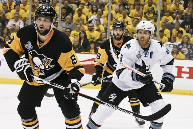 San Jose Sharks' Joe Pavelski (8), right,  plays against Pittsburgh Penguins' Brian Dumoulin (8) during the second period in Game 2 of the NHL hockey Stanley Cup Finals on Wednesday, June 1, 2016, in Pittsburgh. (AP Photo/Keith Srakocic)