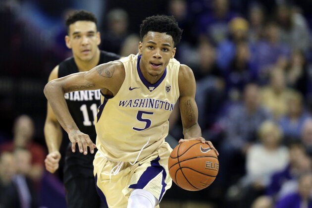Washington guard Dejounte Murray drives down the court against Stanford during an NCAA college basketball game, Saturday, Feb. 20, 2016, in Seattle. (AP Photo/Ted S. Warren)