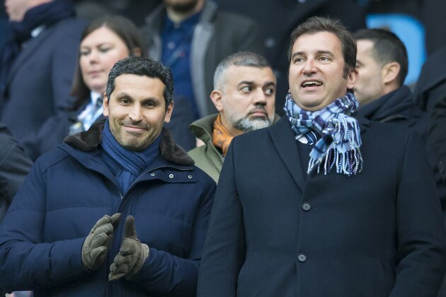Manchester City's Chairman Khaldoon Al Mubarak, left, stands alongside Chief Executive Officer Ferran Soriano before the English Premier League soccer match between Manchester City and Crystal Palace at the Etihad Stadium, Manchester, England, Saturday Jan. 16, 2016. (AP Photo/Jon Super)