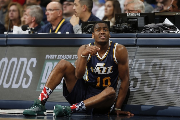 Utah Jazz guard Alec Burks (10) waits by scorer's table in the second half of an NBA basketball game Thursday, Nov. 5, 2015, in Denver. Utah won 96-84. (AP Photo/David Zalubowski) Utah Jazz guard Alec Burks (10) waits by scorer's table in the second half of an NBA basketball game Thursday, Nov. 5, 2015, in Denver. Utah won 96-84. (AP Photo/David Zalubowski)