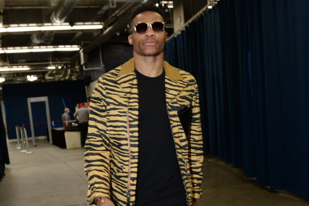 OKLAHOMA CITY, OK - MAY 28:  Russell Westbrook #0 of the Oklahoma City Thunder arrives prior to Game Six of the Western Conference Finals between the Golden State Warriors and Oklahoma City Thunder during the 2016 NBA Playoffs on May 28, 2016 at Chesapeake Energy Arena in Oklahoma City, Oklahoma. NOTE TO USER: User expressly acknowledges and agrees that, by downloading and or using this photograph, User is consenting to the terms and conditions of the Getty Images License Agreement. Mandatory Copyright Notice: Copyright 2016 NBAE (Photo by Andrew D. Bernstein/NBAE via Getty Images)