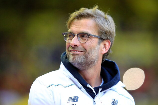 Liverpool manager Juergen Klopp smiles before the Europa League semifinal, second leg, soccer match between Liverpool and  Villarreal at Anfield Stadium, Liverpool, England, Thursday May 5, 2016. (AP Photo/Jon Super)