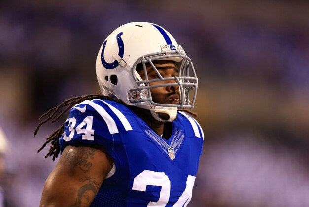 Jan 4, 2015; Indianapolis, IN, USA; Indianapolis Colts running back Trent Richardson (34) against the Cincinnati Bengals during the 2014 AFC Wild Card playoff football game at Lucas Oil Stadium. Mandatory Credit: Andrew Weber-USA TODAY Sports