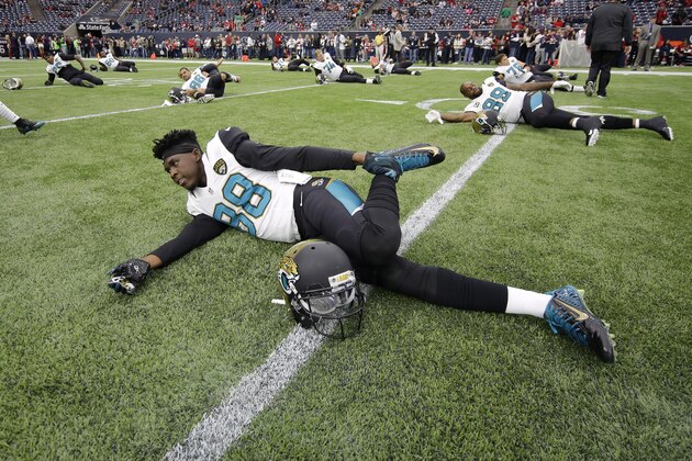 Jacksonville Jaguars wide receiver Allen Hurns (88) stretches with teammates before an NFL football game against the Houston Texans, Sunday, Jan. 3, 2016, in Houston. (AP Photo/David J. Phillip)