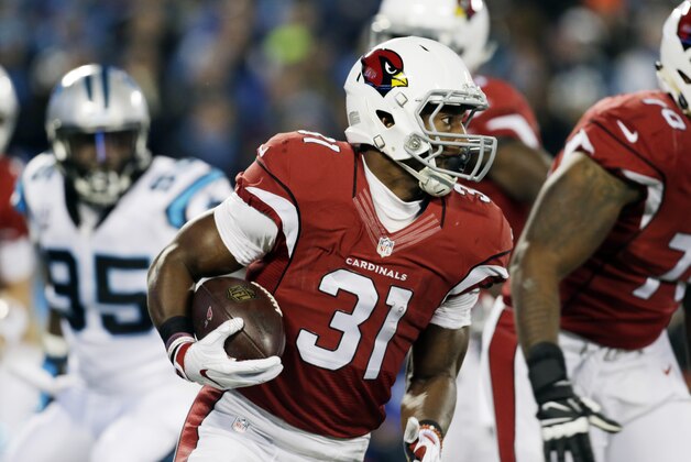 Arizona Cardinals' David Johnson runs during the first half the NFL football NFC Championship game against the Carolina Panthers,  Sunday, Jan. 24, 2016, in Charlotte, N.C. (AP Photo/Bob Leverone)