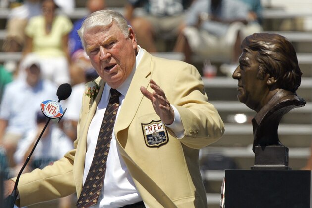FILE - In this Aug. 5, 2006 file photo, former Oakland Raiders coach John Madden gestures toward his bust during his enshrinement into the Pro Football Hall of Fame  in Canton, Ohio. Madden, 73, the burly former head coach who worked as a broadcast analyst for all four major networks, is calling it quits. Madden worked for the past three seasons on NBC's Sunday night NFL game. His last telecast was the Super Bowl between Arizona and Pittsburgh. (AP Photo/Mark Duncan, file)