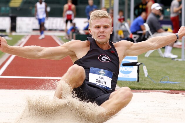 Georgia's Karl Saluri competes in the long jump event in the decathlon competition at the NCAA track and field championships in Eugene, Ore., Wednesday, June 8, 2016. (AP Photo/Ryan Kang)