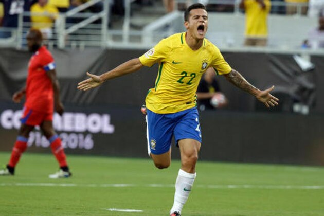 Brazil's Philippe Coutinho (22) celebrates after scoring a goal against Haiti during the first half of a Copa America group B soccer match Wednesday, June 8, 2016, in Orlando, Fla. (AP Photo/John Raoux)