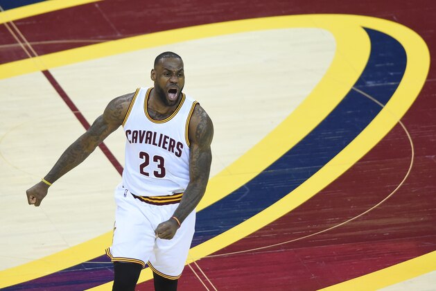 Jun 8, 2016; Cleveland, OH, USA; Cleveland Cavaliers forward LeBron James (23) celebrates after scoring against the Golden State Warriors during the first quarter in game three of the NBA Finals at Quicken Loans Arena. Mandatory Credit: Ken Blaze-USA TODAY Sports