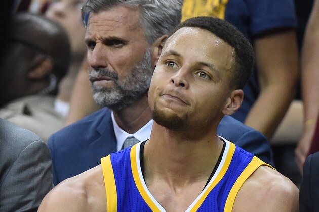 Jun 8, 2016; Cleveland, OH, USA; Golden State Warriors guard Stephen Curry (30) looks on from the bench during the second quarter in game three of the NBA Finals against the Cleveland Cavaliers at Quicken Loans Arena. Mandatory Credit: Ken Blaze-USA TODAY Sports