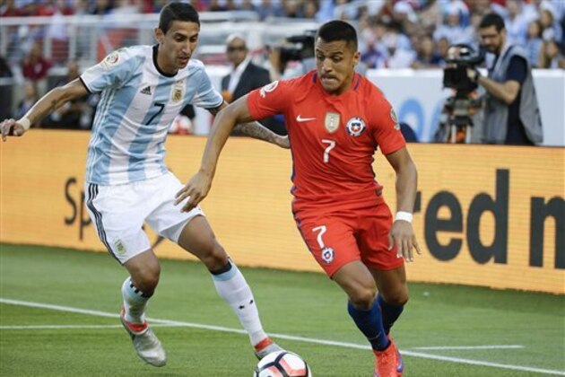 Chile’s Alexis Sanchez, right, vies for the ball against Argentina’s Angel Di Maria, left, during a Copa America Centenario Group A soccer match at the Levi's Stadium in Santa Clara, Calif., Monday, June 6, 2016. (AP Photo/ Marcio Jose Sanchez)