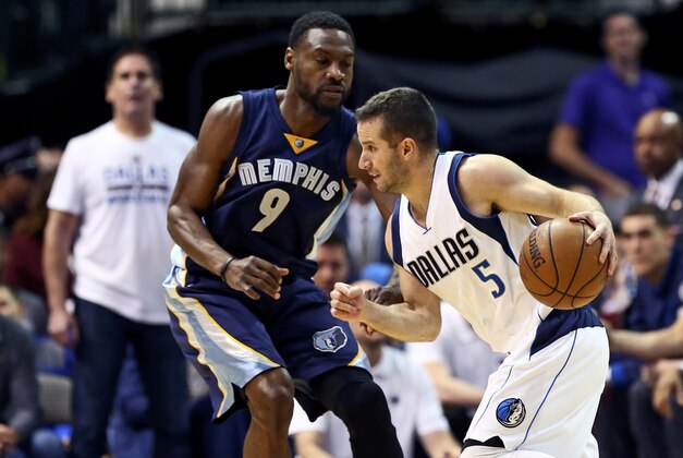 Apr 8, 2016; Dallas, TX, USA; Dallas Mavericks guard J.J. Barea (5) dribbles as Memphis Grizzlies guard Tony Allen (9) defends during the first quarter at American Airlines Center. Mandatory Credit: Kevin Jairaj-USA TODAY Sports