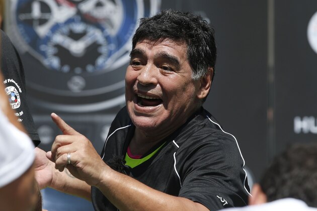 Former Argentinian football international Diego Maradona reacts during a football match organised by Swiss luxury watchmaker Hublot at the Jardin du Palais Royal in Paris on June 9, 2016, on the eve of the Euro 2016 European football championships. / AFP / PATRICK KOVARIK        (Photo credit should read PATRICK KOVARIK/AFP/Getty Images)