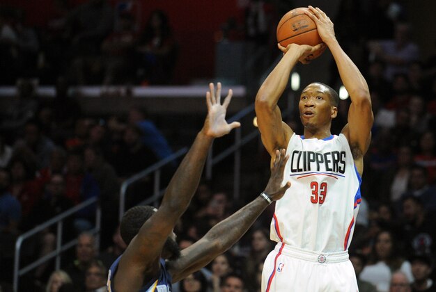April 12, 2016; Los Angeles, CA, USA; Los Angeles Clippers forward Wesley Johnson (33) shoots against the Memphis Grizzlies during the second half at Staples Center. Mandatory Credit: Gary A. Vasquez-USA TODAY Sports