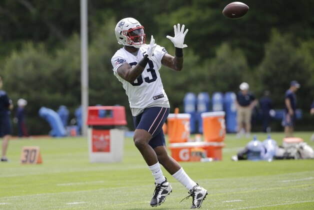 New England Patriots tight end Martellus Bennett (83) catches a pass during an NFL football practice Wednesday, June 8, 2016 in Foxborough, Mass. (AP Photo/Elise Amendola)