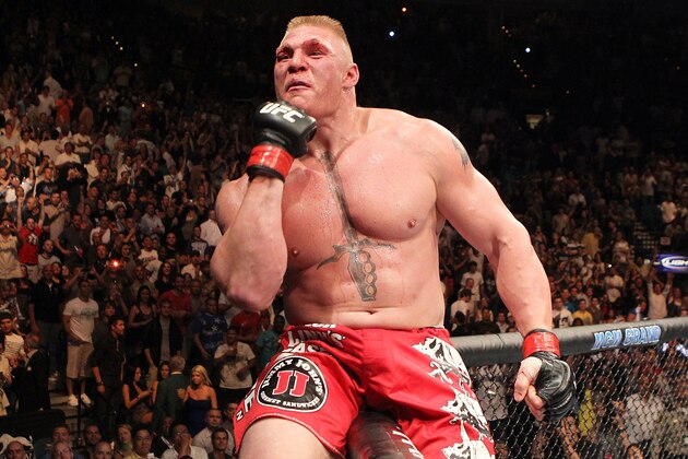 LAS VEGAS - JULY 03:  Brock Lesnar reacts after his second round submission victory against Shane Carwin to win the UFC Heavyweight Championship Unification bout at the MGM Grand Garden Arena on July 3, 2010 in Las Vegas, Nevada.  (Photo by Josh Hedges/Zuffa LLC/Zuffa LLC via Getty Images)