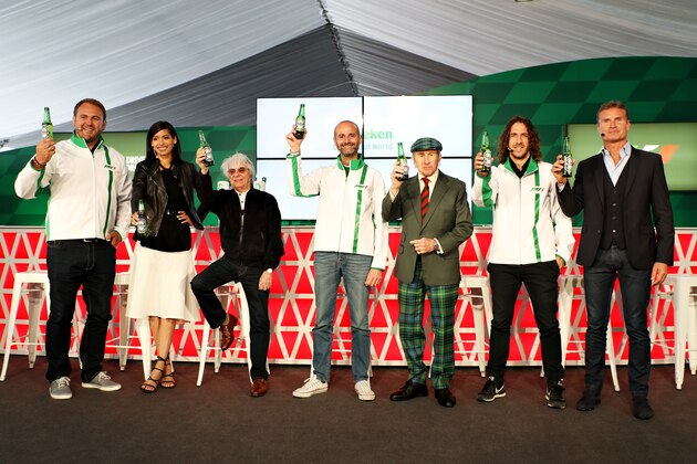 MONTREAL, QC - JUNE 09:  Heineken announces global partnership with Formula One Management. F1 supremo Bernie Ecclestone, centre, joins Gianluca Di Tondo, Senior Director Global Heineken Brand and Heineken ambassadors (left to right) Scott Quinnell, Stephanie Sigman, Sir Jackie Stewart, Carles Puyol and David Coulthard during previews to the Canadian Formula One Grand Prix at Circuit Gilles Villeneuve on June 9, 2016 in Montreal, Canada.  (Photo by Mark Thompson/Getty Images)