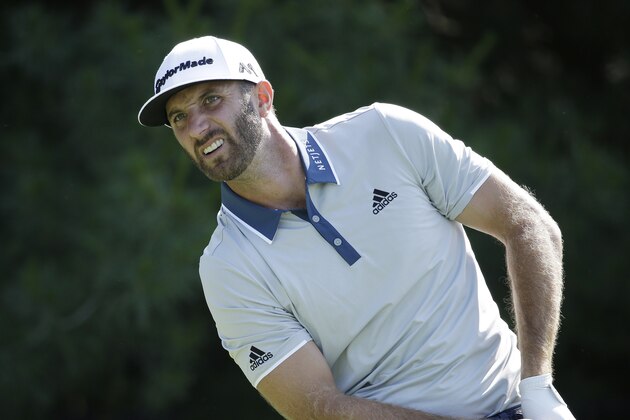 Dustin Johnson watches his drive on the 17th hole during the final round of the Memorial golf tournament, Sunday, June 5, 2016, in Dublin, Ohio. (AP Photo/Darron Cummings)