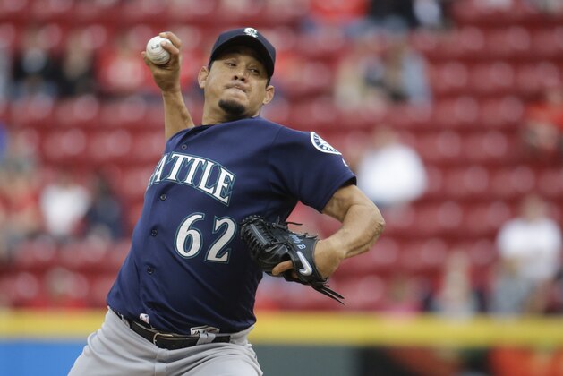 Seattle Mariners relief pitcher Joel Peralta throws in the ninth inning of a baseball game against the Cincinnati Reds, Saturday, May 21, 2016, in Cincinnati. The Mariners won 4-0. (AP Photo/John Minchillo)