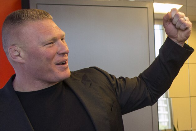 Former UFC heavyweight champion Brock Lesnar pauses for a photo after ruling out a return to mixed martial arts, ending three years of speculation about the biggest pay-per-view star in the sport's history, as he announced he had re-signed with WWE in an interview on ESPN's