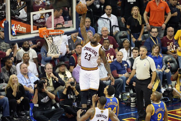 CLEVELAND, OH - JUNE 8:  (Dunk Sequence 2 of 4) LeBron James #23 of the Cleveland Cavaliers dunks the ball against the Golden State Warriors in Game Three of the 2016 NBA Finals on June 8, 2016 at The Quicken Loans Arena in Cleveland, Ohio. NOTE TO USER: User expressly acknowledges and agrees that, by downloading and or using this photograph, user is consenting to the terms and conditions of Getty Images License Agreement. Mandatory Copyright Notice: Copyright 2016 NBAE (Photo by Joe Murphy/NBAE via Getty Images)