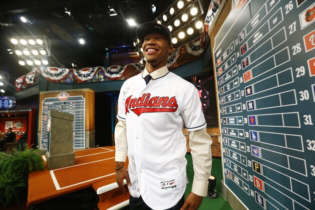 Will Benson, an outfielder from The Westminster Schools in Atlanta, looks on after being drafted No. 14 by the Cleveland Indians in the first round of the Major League Baseball draft, Thursday, June 9, 2016, in Secaucus, N.J. (AP Photo/Julio Cortez)