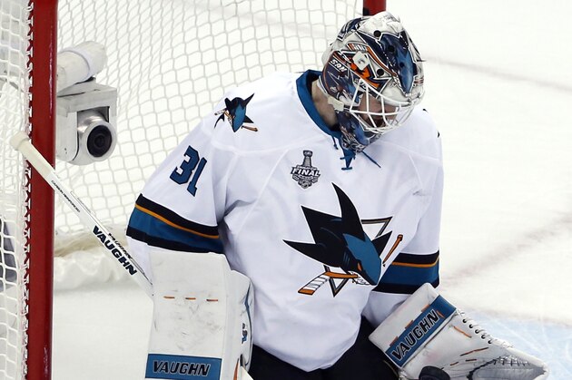 San Jose Sharks goalie Martin Jones grabs the puck during the second period in Game 5 of the NHL hockey Stanley Cup Finals against the Pittsburgh Penguins on Thursday, June 9, 2016, in Pittsburgh. (AP Photo/Gene J. Puskar)