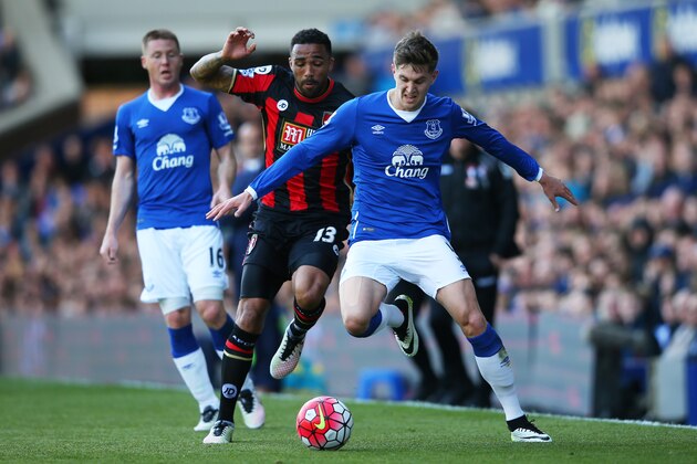 LIVERPOOL, UNITED KINGDOM - APRIL 30:  John Stones of Everton and Callum Wilson of Bournemouth compete for the ball during the Barclays Premier League match between Everton and A.F.C. Bournemouth at Goodison Park on April 30, 2016 in Liverpool, England.  (Photo by Alex Livesey/Getty Images)